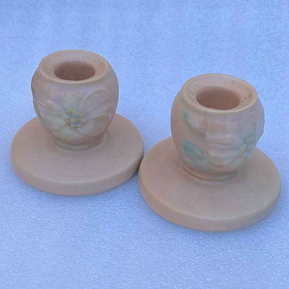 ROSEVILLE Pair of candlestick holders, vintage 1940’s. Delicate peachy glaze